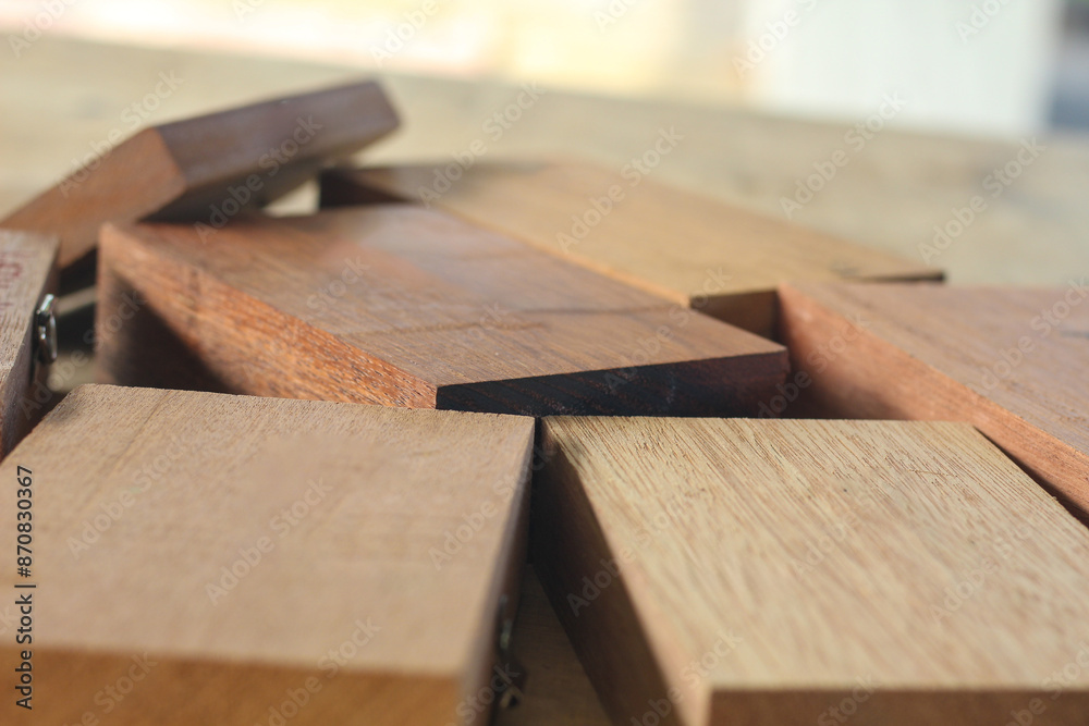 Pile of cut wooden blocks and planks, wood material Pile of cut wooden blocks and planks, wood material