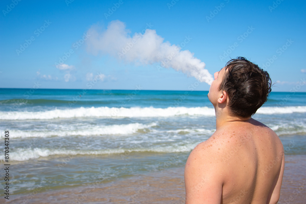 Summer and vacation. Attractive man relaxing by the sea. Summer and vacation. Attractive man relaxing by the sea.