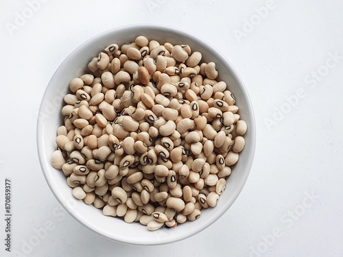 feijão fradinho grains with bowl and  white background photo