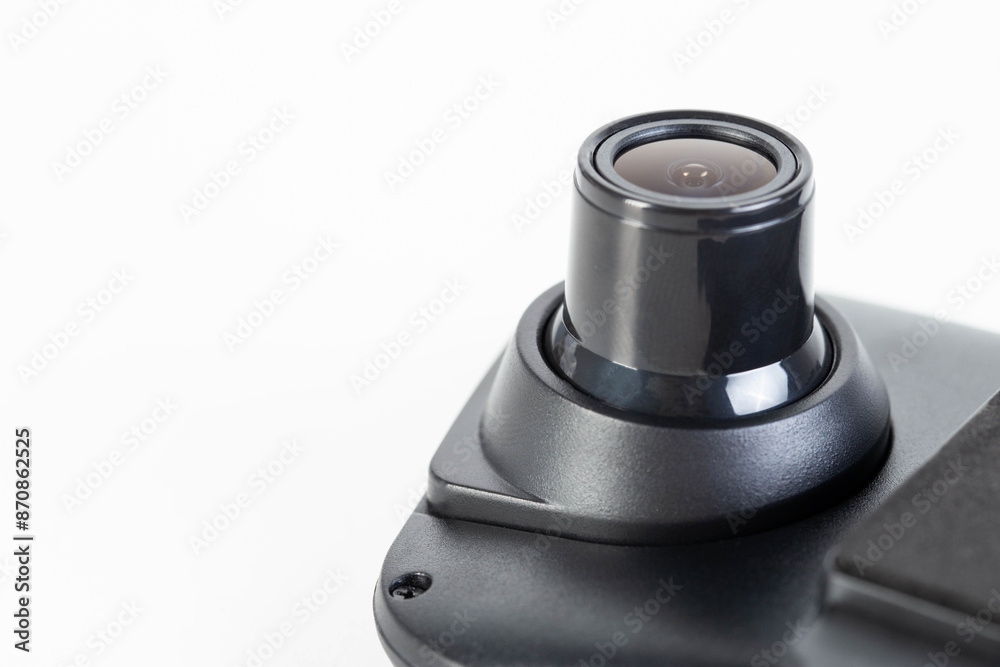 DVR camera eye on a white background, maximum video recording resolution and frame rate. Car mirror with video recorder. Copy space for text DVR camera eye on a white background, maximum video recording resolution and frame rate. Car mirror with video recorder. Copy space for text
