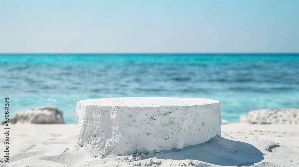 White round rock podium with ocean beach sea background for product presentation White round rock podium with ocean beach sea background for product presentation
