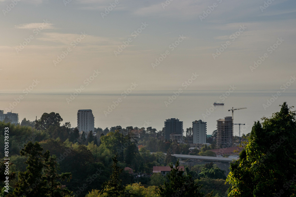 Town on the coast. View of the city and the sea from the hill. Town on the coast. View of the city and the sea from the hill.