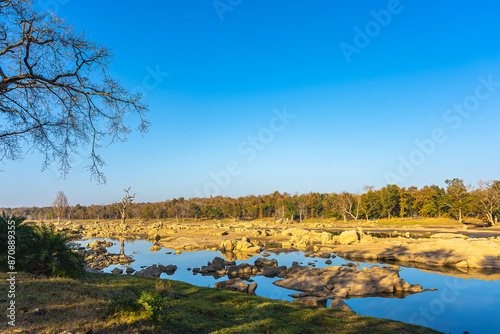 The Pench River flows through Pench Tiger Reserve, providing vital water sources for wildlife and creating a scenic landscape cherished by visitors and conservationists alike.