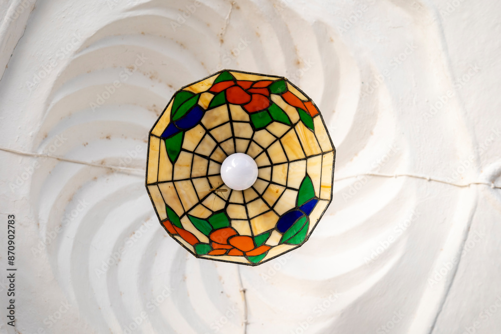 Ornamental Glass Multi Color Lamp Against White Ceilings in An Nabi Musa Mosque