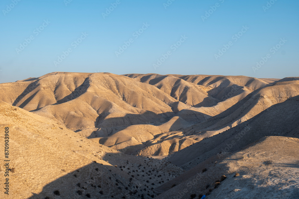 Dry Sandstones Mountain Ranges and Valleys with Hard Shadows Seen From Afar near the Dead Sea at Sunset