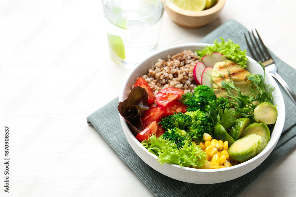 Healthy meal. Tasty products in bowl on white table, space for text Healthy meal. Tasty products in bowl on white table, space for text