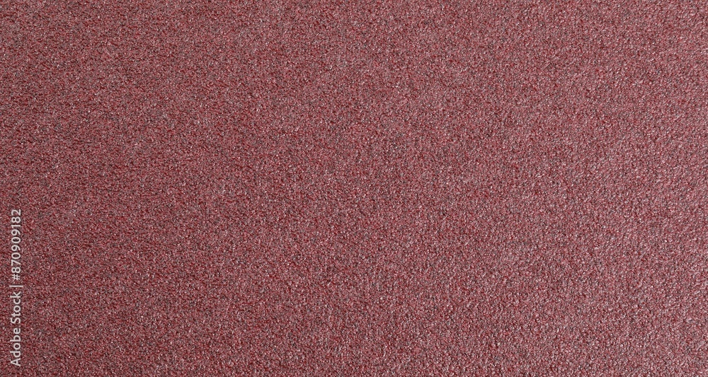 Fototapeta premium Texture of coarse sandpaper as background, top view