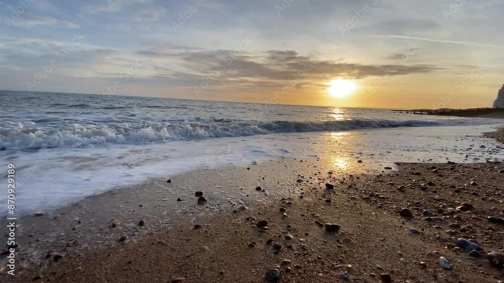 sunset at beach waves lapping at UK beach, travel vacation video footage sunset at beach waves lapping at UK beach, travel vacation video footage