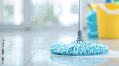 Eye-Level Angle, a person cleaning hard floors with a mop, surrounded by cleaning tools and supplies, in a well-kept and spacious home, with text copy space on the right side, prof