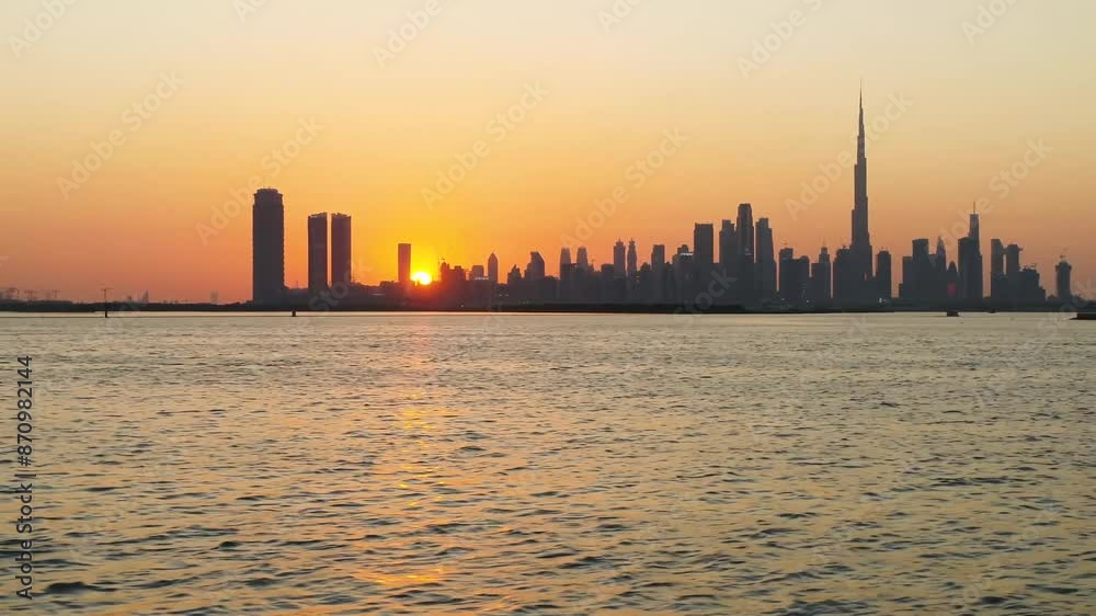 Aerial birds eye view of Dubai city urban futuristic skyline. Panning shot of Dubai