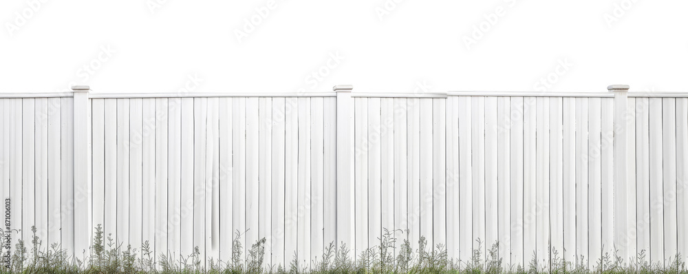 Fototapeta premium Horizontal view of a tall white slatted vinyl privacy fence against a clear, ideal for residential or commercial property use.