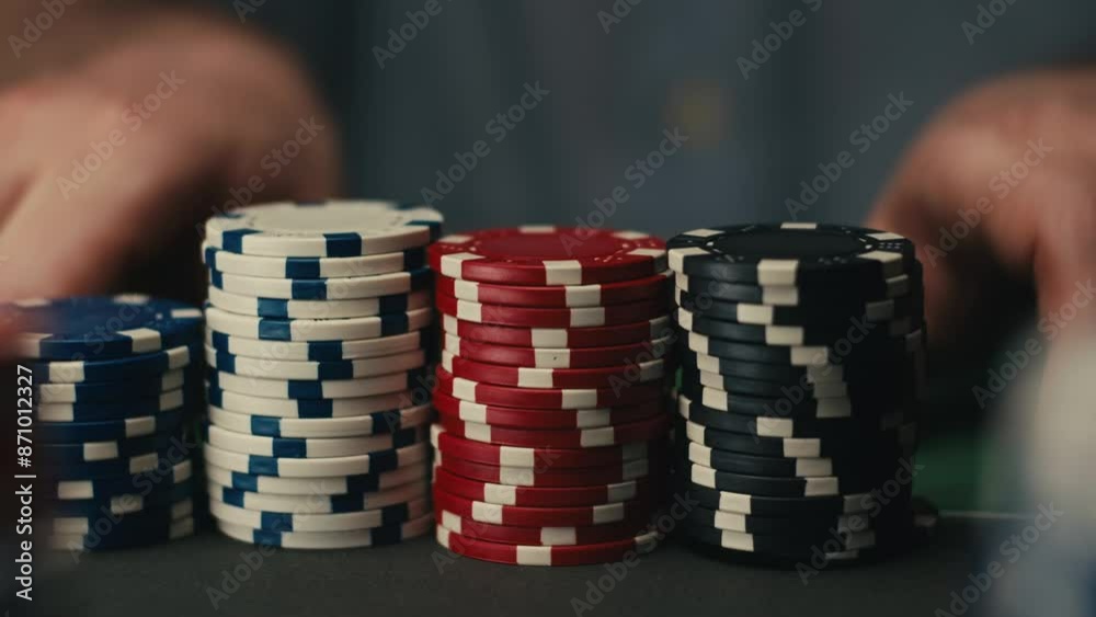 Game of poker in casino, taking place with poker chips and cards on a green table, gambling place, roulette jack pot. Game of poker in casino, taking place with poker chips and cards on a green table, gambling place, roulette jack pot.