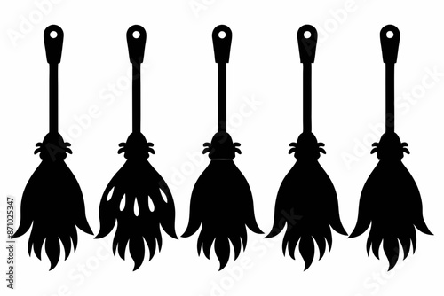 Witch brooms. Set of black silhouettes of brooms isolated on a white background. Vector illustration