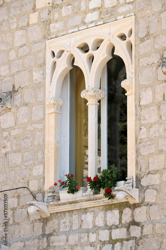 ancient window in Bol, island Brac, Croatia © Susy