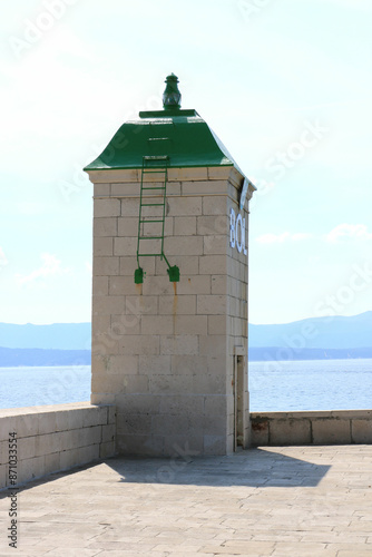 green roofed lighthouse of Bol, island Brac, Croatia © Susy