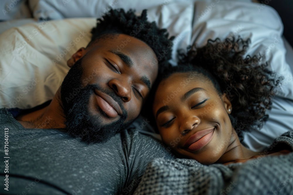 A couple lying in bed, relaxed and intimate A couple lying in bed, relaxed and intimate