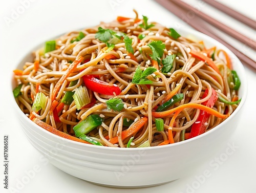 refreshing soba noodle salad with cucumbers, carrots, and a sesame dressing, isolated on a white background to highlight a healthy and satisfying dish. photo