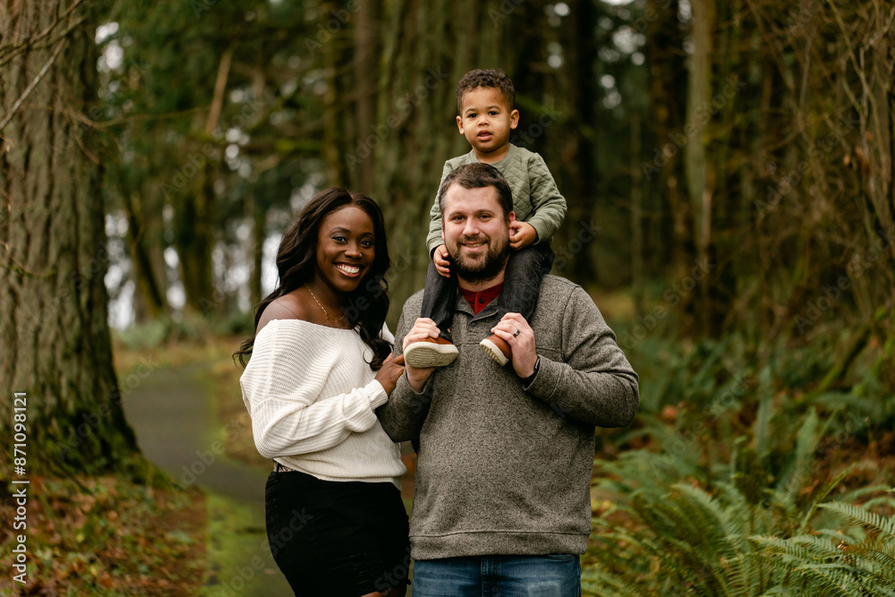 Beautiful, Diverse Family Posed for Portrait in Woodsy Nature Park Beautiful, Diverse Family Posed for Portrait in Woodsy Nature Park