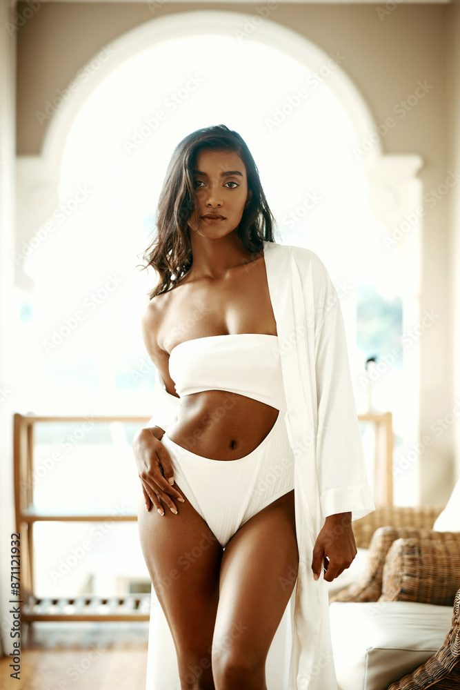 © CoetzeeRising/peopleimages.com - Woman, resort and sexy in swimwear on portrait with shirt for body positivity and empowerment. Female person, confidence and comfortable with underwear or bikini for desire, fashion and self care