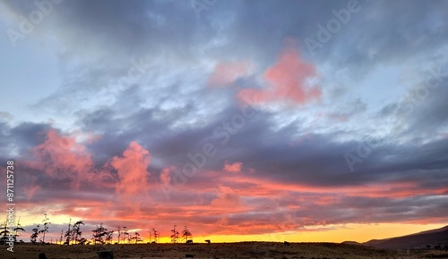Colorful sunset over the pastures of Pu'ukapu, Waimea, Hawaii Island 