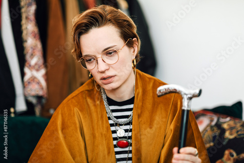 Pensive Young Woman with Walking Cane