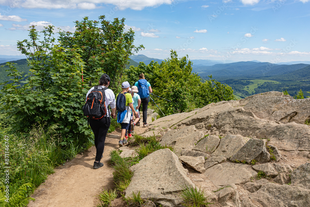 Fototapeta premium Hiking in the Bieszczady mountains. Mountain walking. Summer in the Bieszczady mountains. Polish Mountains.