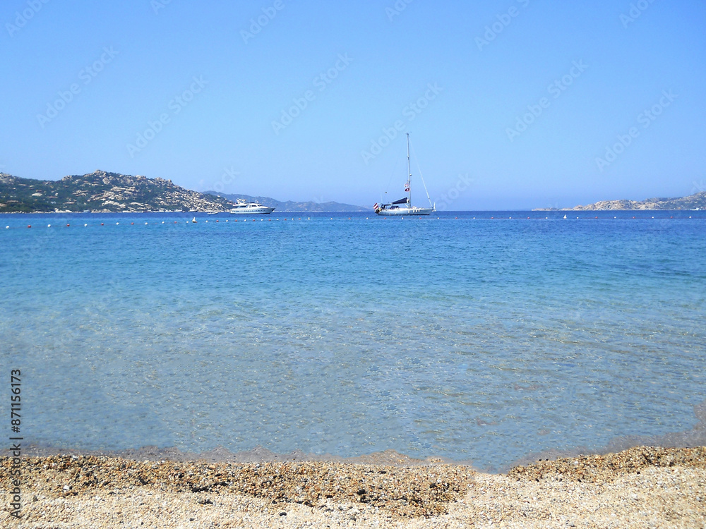 Beautiful sea in Sardinia, Italy. Beach in island Maddalena. Blue clear water sea in Italy. Beautiful background with sea. Beautiful sea in Sardinia, Italy. Beach in island Maddalena. Blue clear water sea in Italy. Beautiful background with sea.