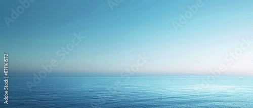 Obraz na płótnie Serene view of the blue ocean meeting the sky at dawn, creating a tranquil and peaceful atmosphere.
w salonie