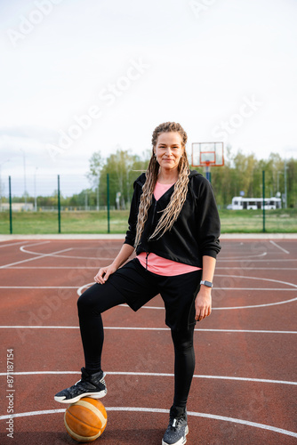 Portrait of a woman on a basketball field