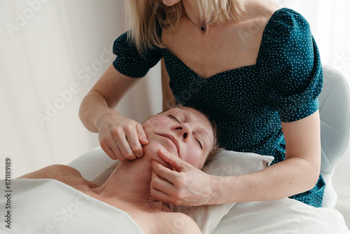 Therapeutic Neck Massage in Progress