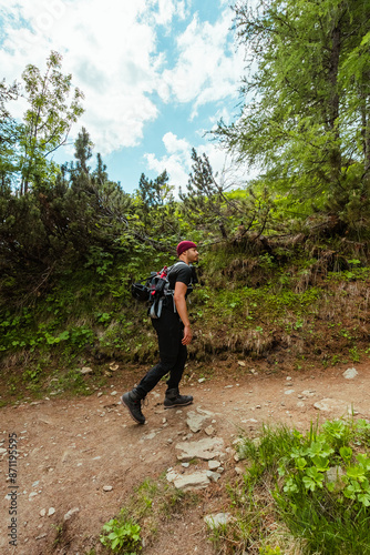 Climber Hiking up the Mountain Trail photo