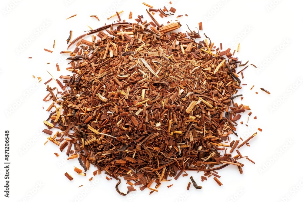 Fototapeta premium Pile of rooibos tea from above on white background