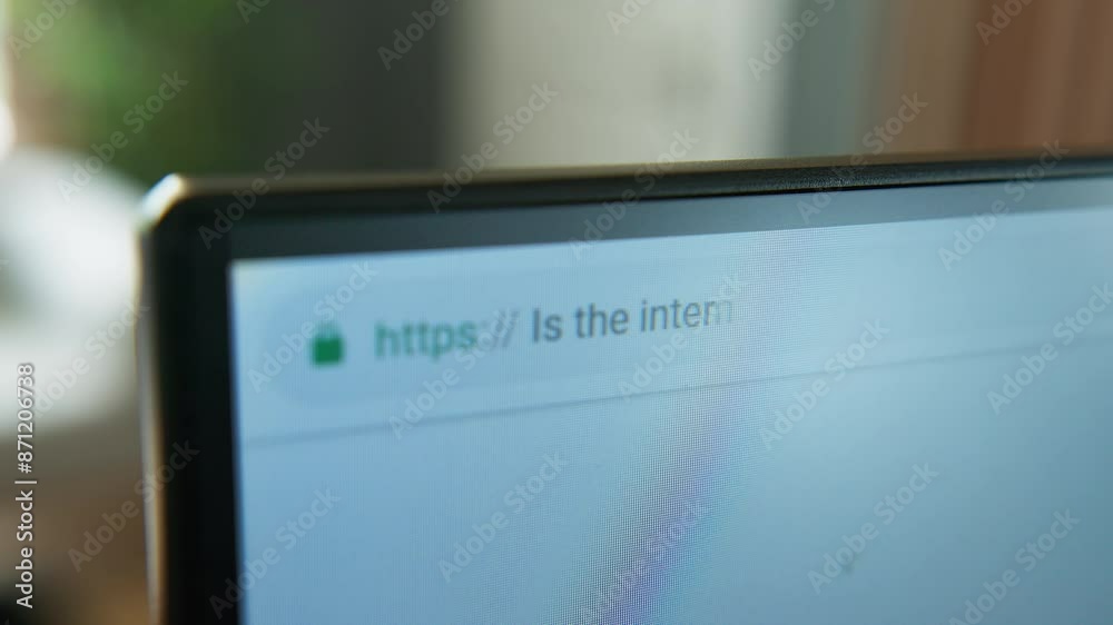 Close-up view of a computer monitor displaying a web browser with the search query 