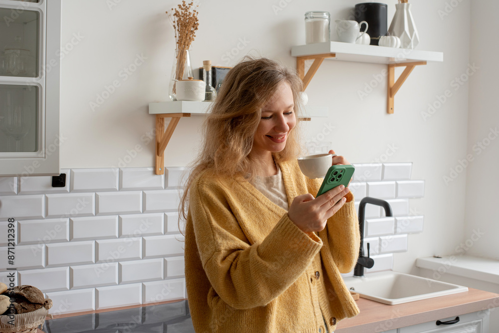 Woman Drinking Coffee While Using Her Smartphone Woman Drinking Coffee While Using Her Smartphone