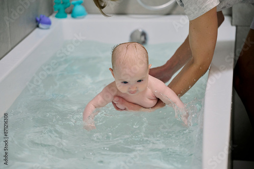 Baby having a bath photo