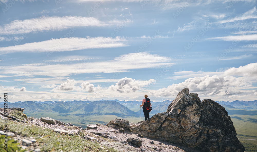 Hiker and majestic wide scenery Hiker and majestic wide scenery