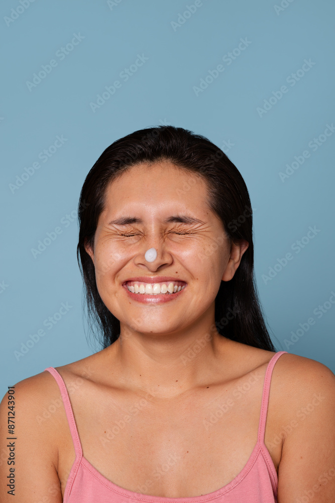 Laughing woman with a little foam on her nose Laughing woman with a little foam on her nose