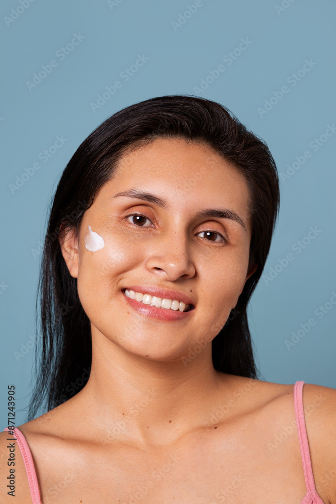 Woman with facial cream on her face Woman with facial cream on her face
