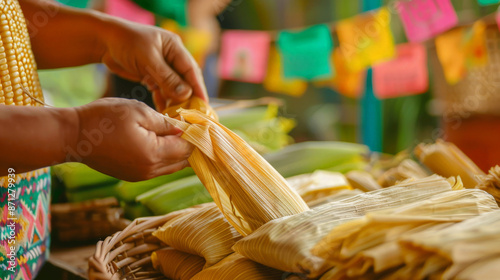 Fresh tamale in the corn husk, juicy and soft tamale, June festival with flags in the background photo