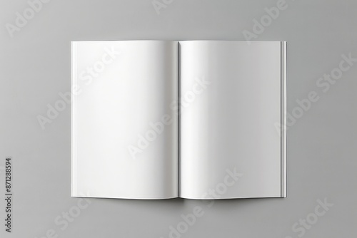 Blank white open magazine on the grey background