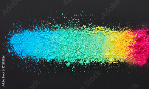 brushstroke of color powder in the middle, black background