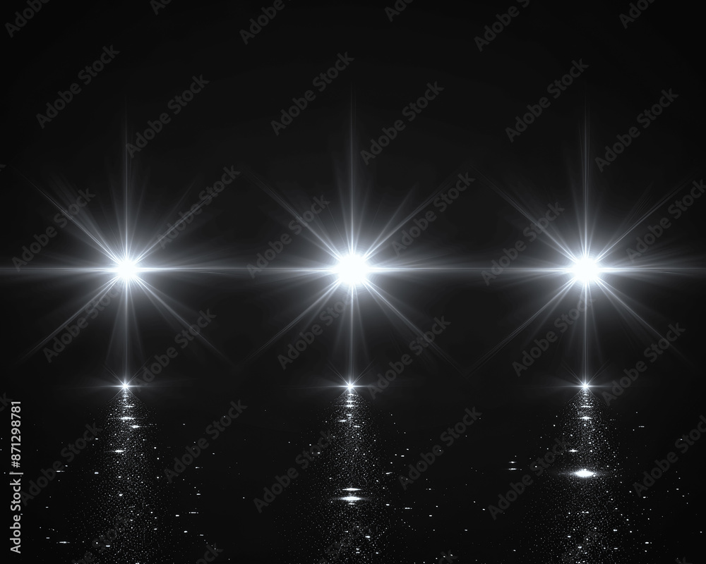 Photorealistic glowing white lens flares on black backdrop Photorealistic glowing white lens flares on black backdrop