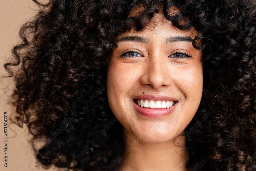 Radiant smile - close-up portrait of a joyful woman Radiant smile - close-up portrait of a joyful woman