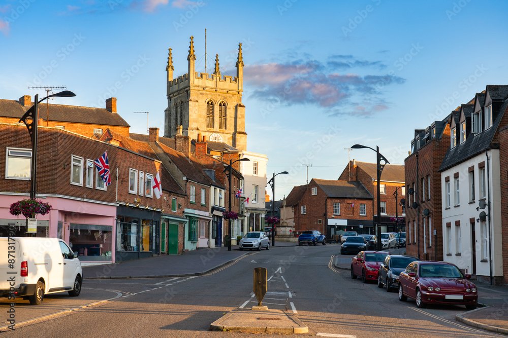 Naklejka premium Newport Pagnell high street with tower of St Peter and St Paul's Church. Buckinghamshire. England