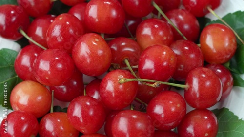 Close up shot Red Cherry fruit on wooden background, Japanese Red highest variety of Yamagata cherries on white table.