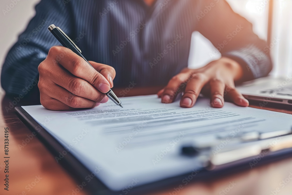 Couple signing a contract on a meeting with real estate agent Couple signing a contract on a meeting with real estate agent