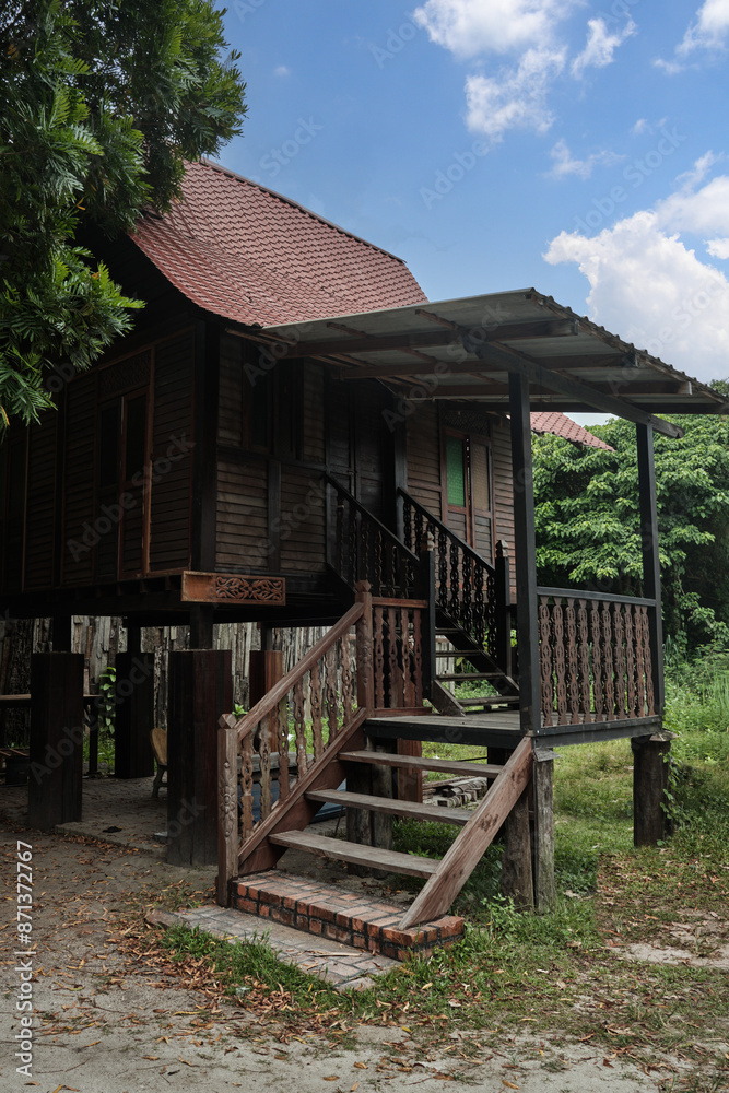A view of traditional wooden Malay house A view of traditional wooden Malay house