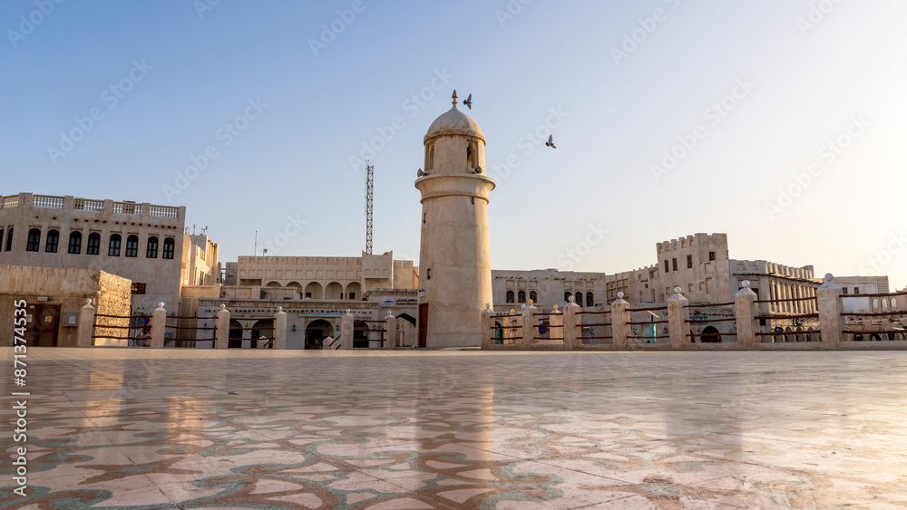 Obraz premium Al Ahmad Mosque in Doha. Souq Waqif is the popular traditional market in Doha, Qatar