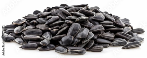Obraz na płótnie Pile of black sunflower seeds on a white background w salonie