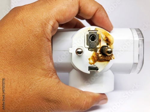 old burnt electrical plug plug isolated white